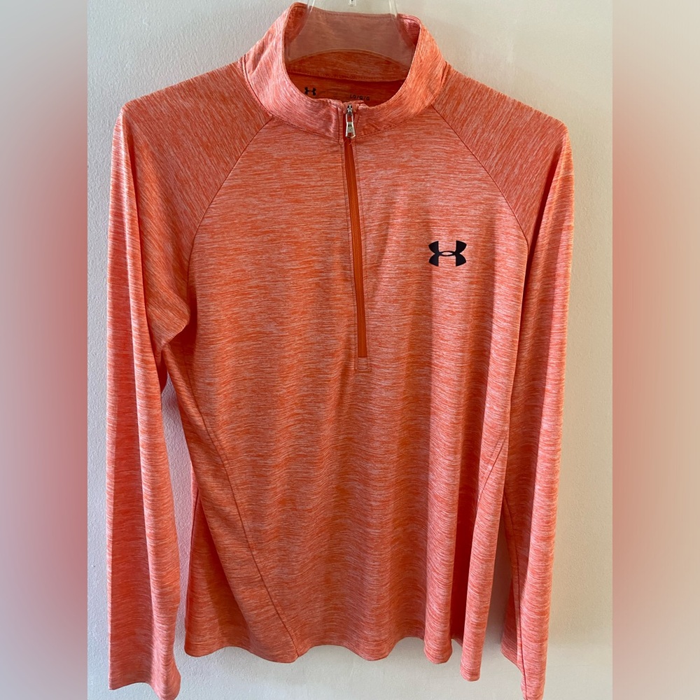 Great athletic attire. More of a orange tone in color.